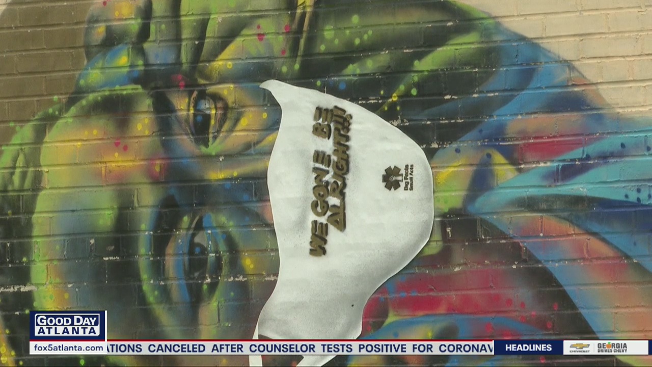 Murals encouraging face coverings