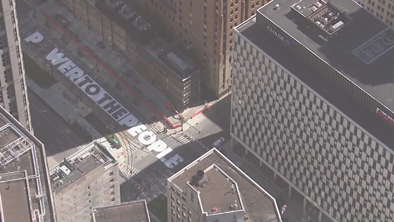 City of Detroit paints mural on Woodward 'Power to the People'