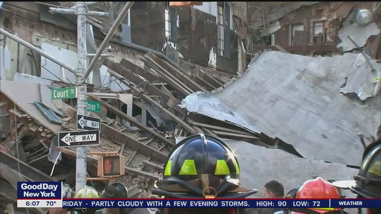Cleanup begins in building collapse