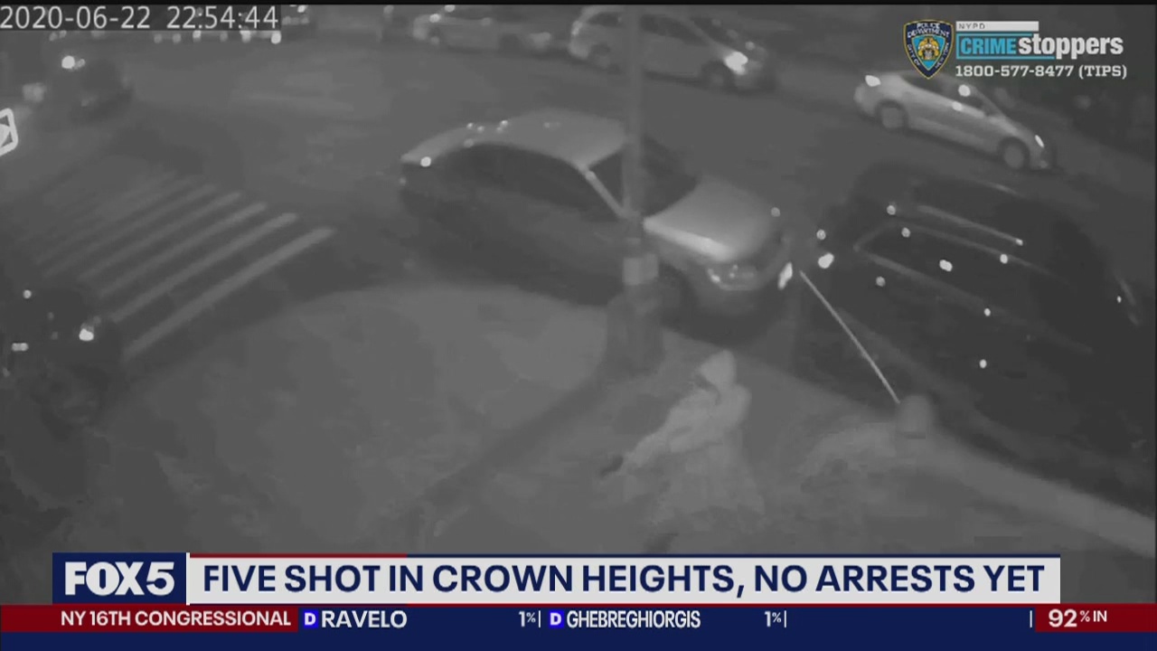 5 shot during candlelight vigil