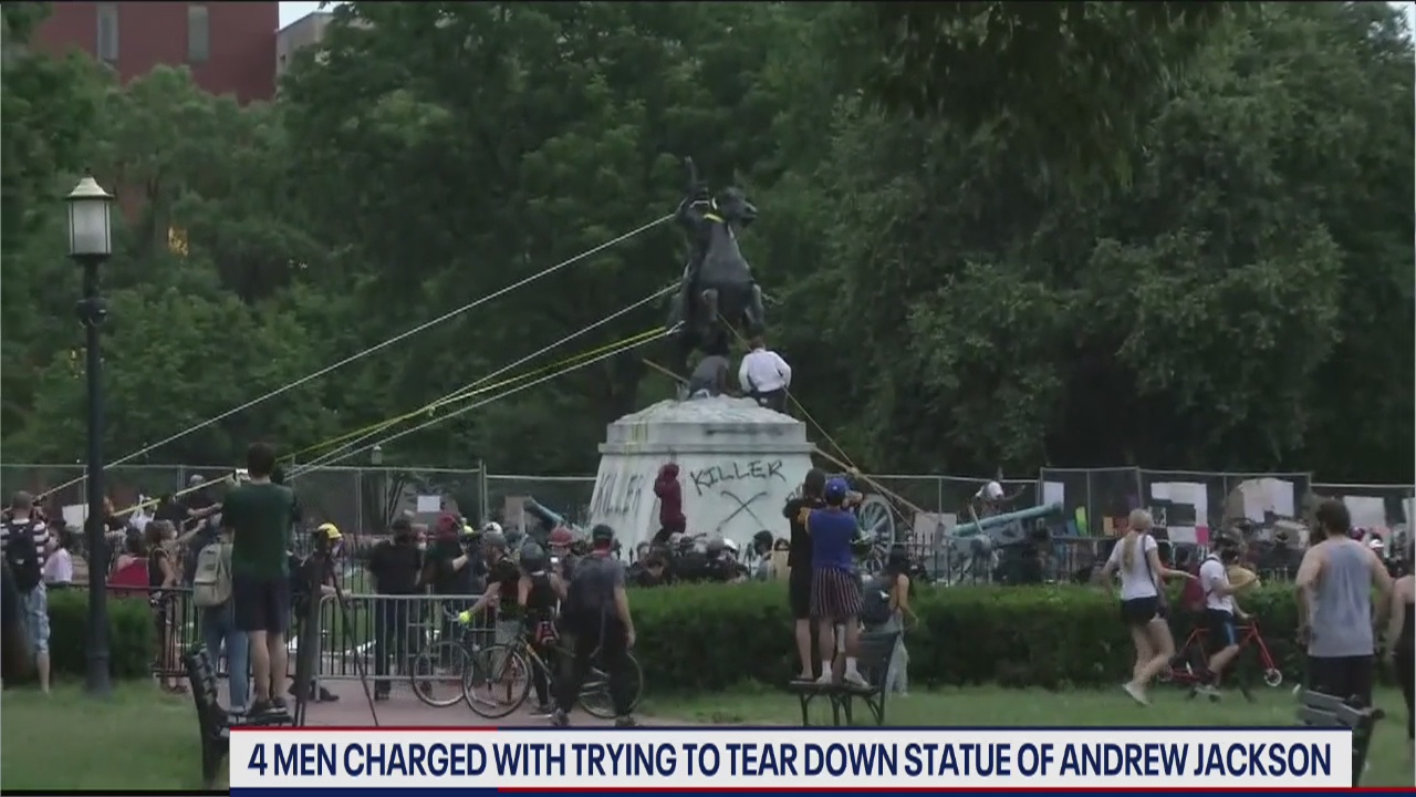 Four charged in Andrew Jackson statue attack case