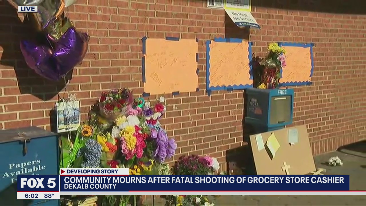 Community mourns cashier killed by gunman