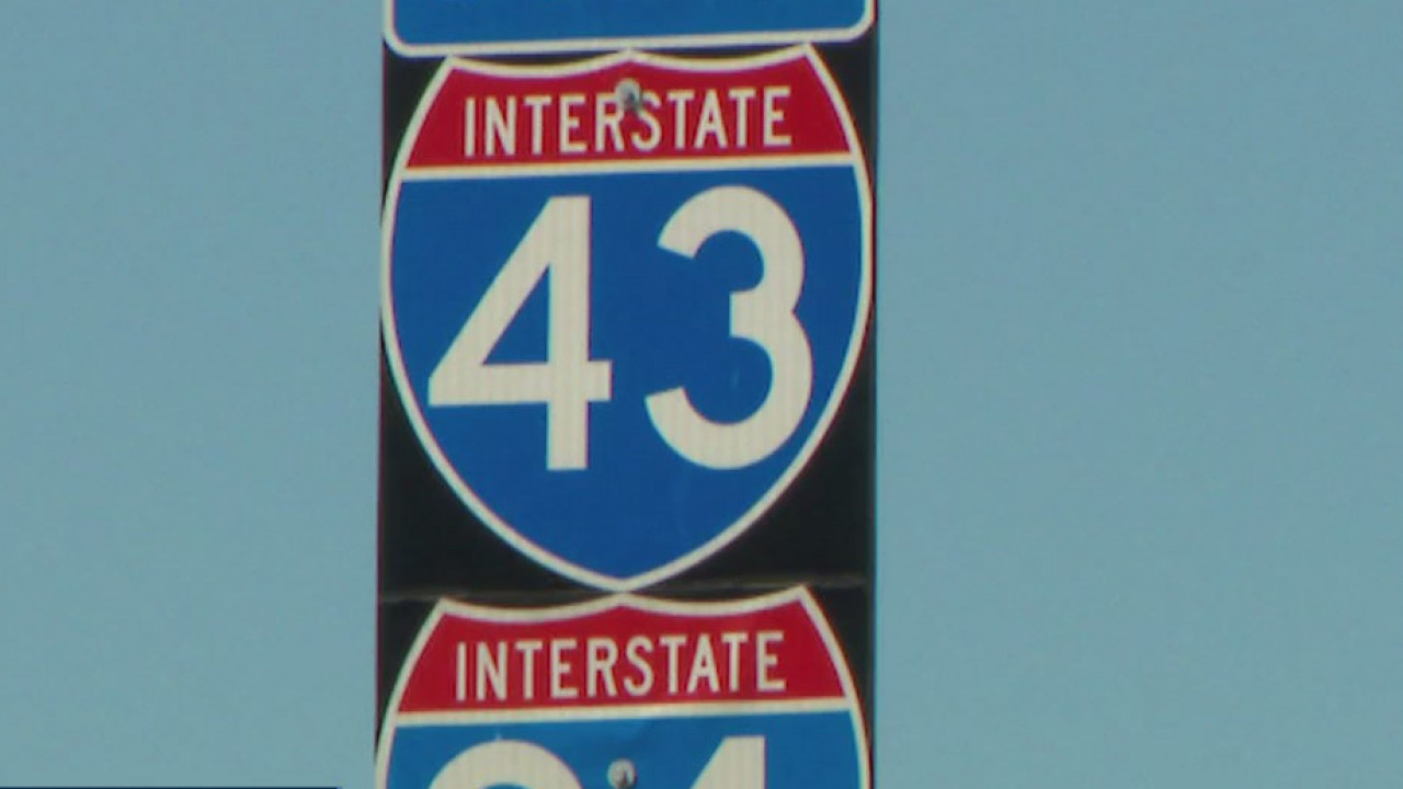 Freeway closed for nearly four hours due to subject on overpass