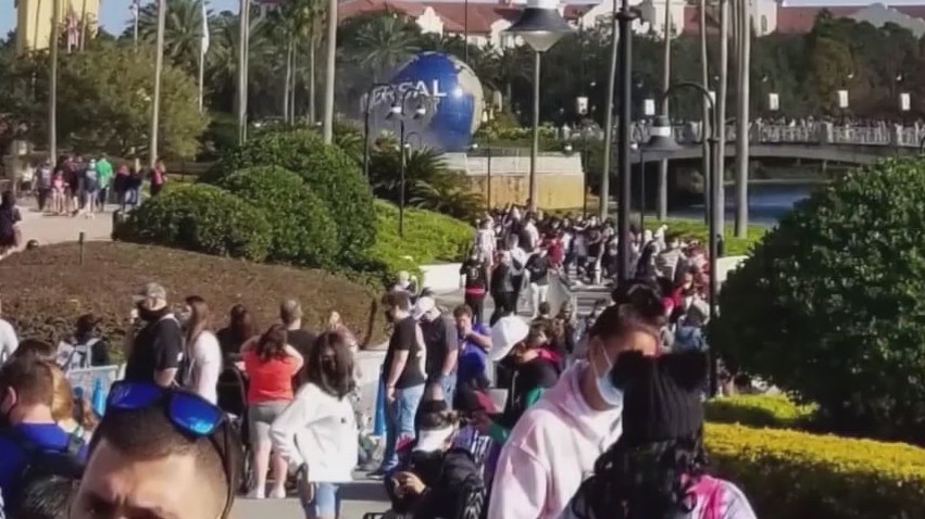 Theme parks hit capacity as holiday crowds visit