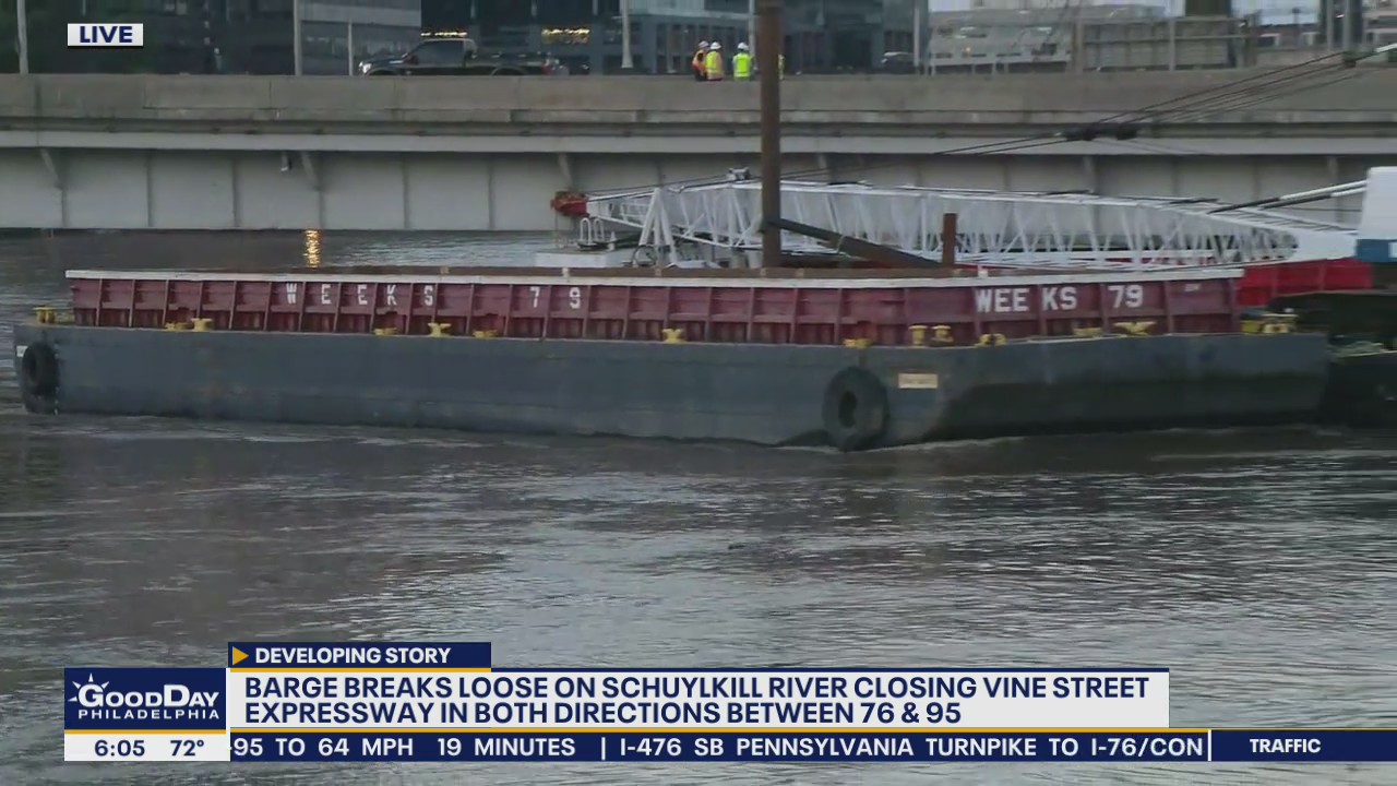 Unsecured barge wedges under bridge closing on Vine Street Expressway