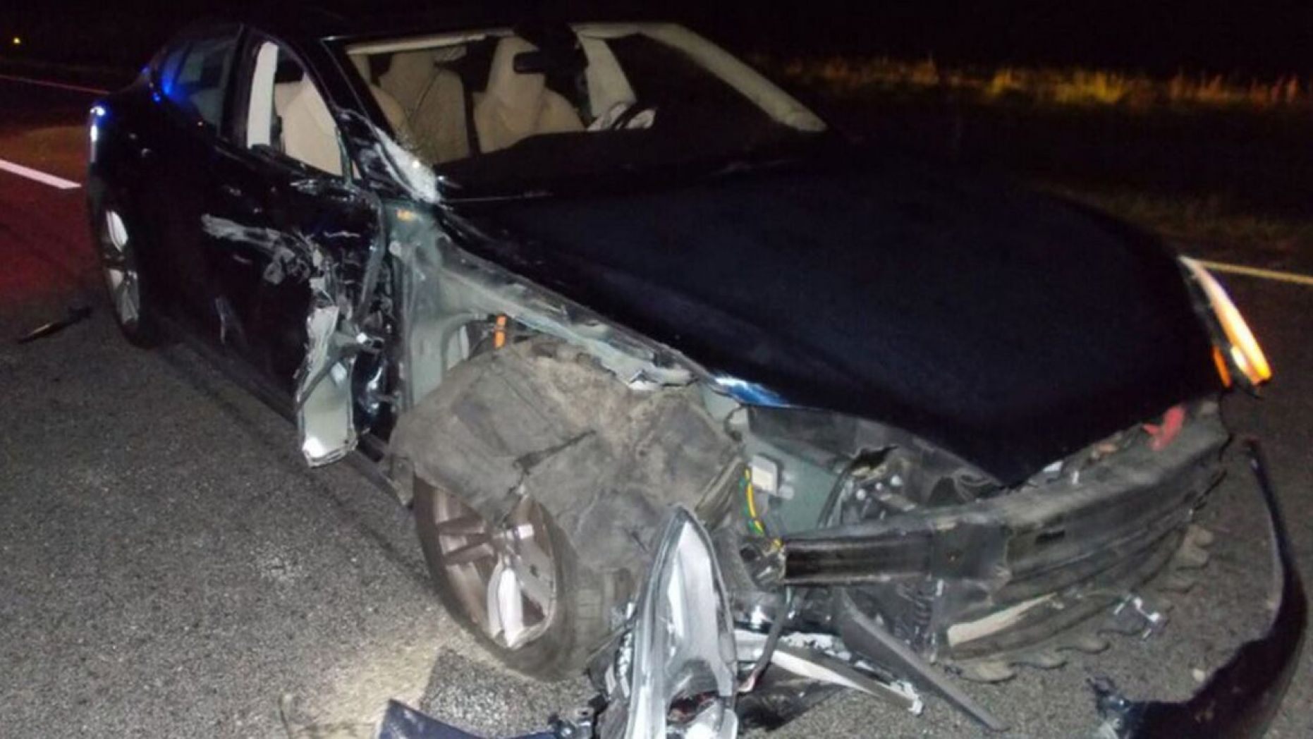 Tesla on autopilot crashes into cop car as driver watches movie on phone
