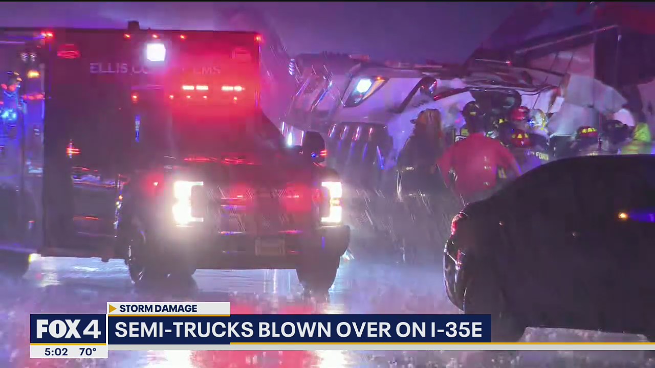 18-wheelers blown over on I-35E