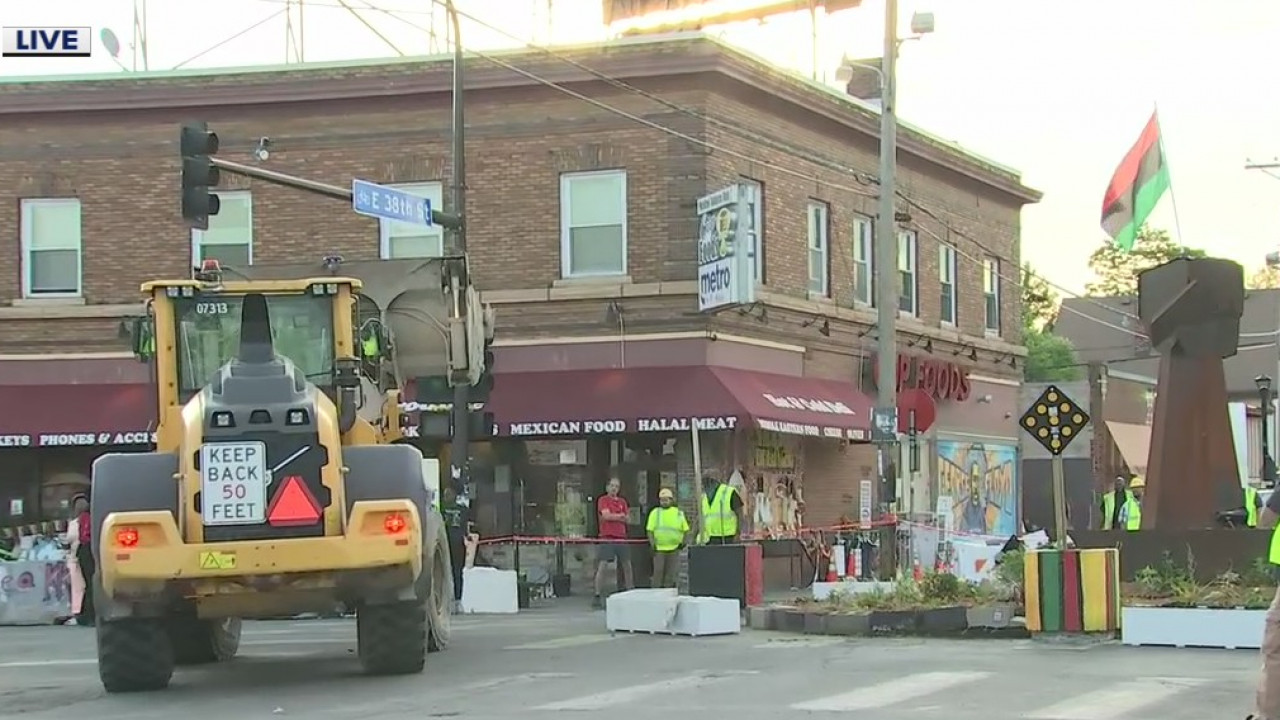 Community members, city workers begin the process of reopening George Floyd Square to traffic