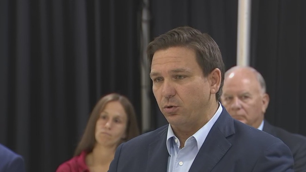 Governor pushes back on schools requiring masks