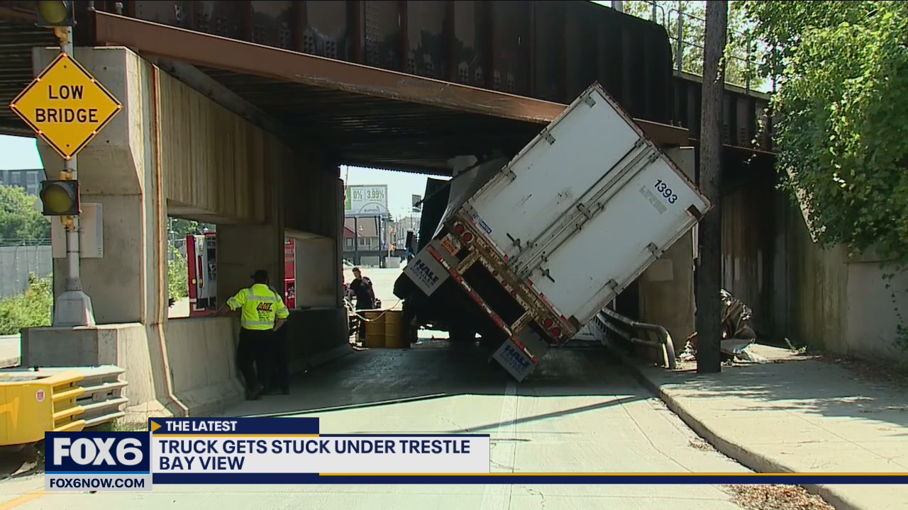 Truck gets stuck under Bay View bridge