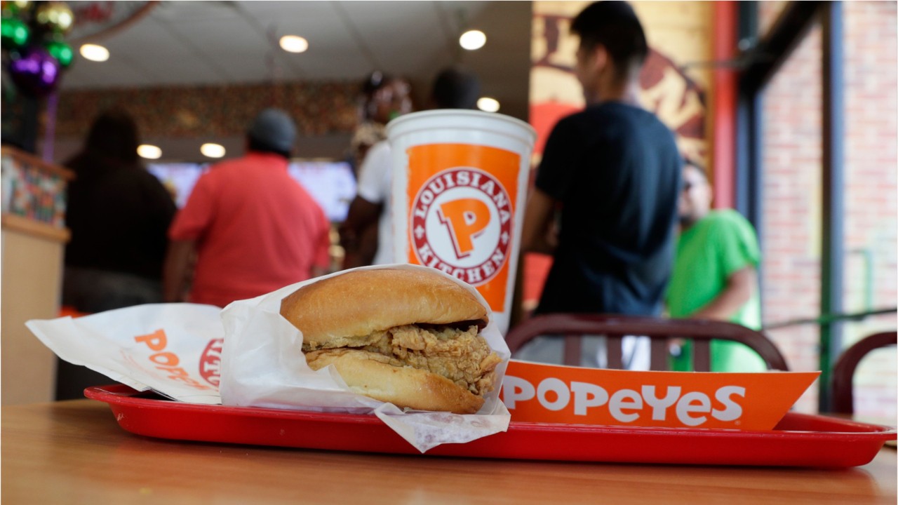 Woman scrapes car to cut in drive-thru line as Popeyes chicken sandwich craze continues