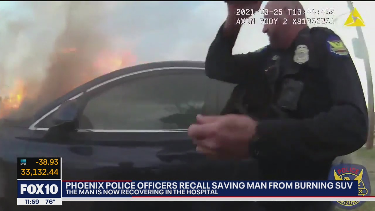 Phoenix Police officers recall saving man from burning SUV