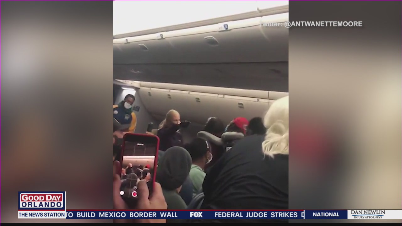 Airline passenger hits flight attendant in face