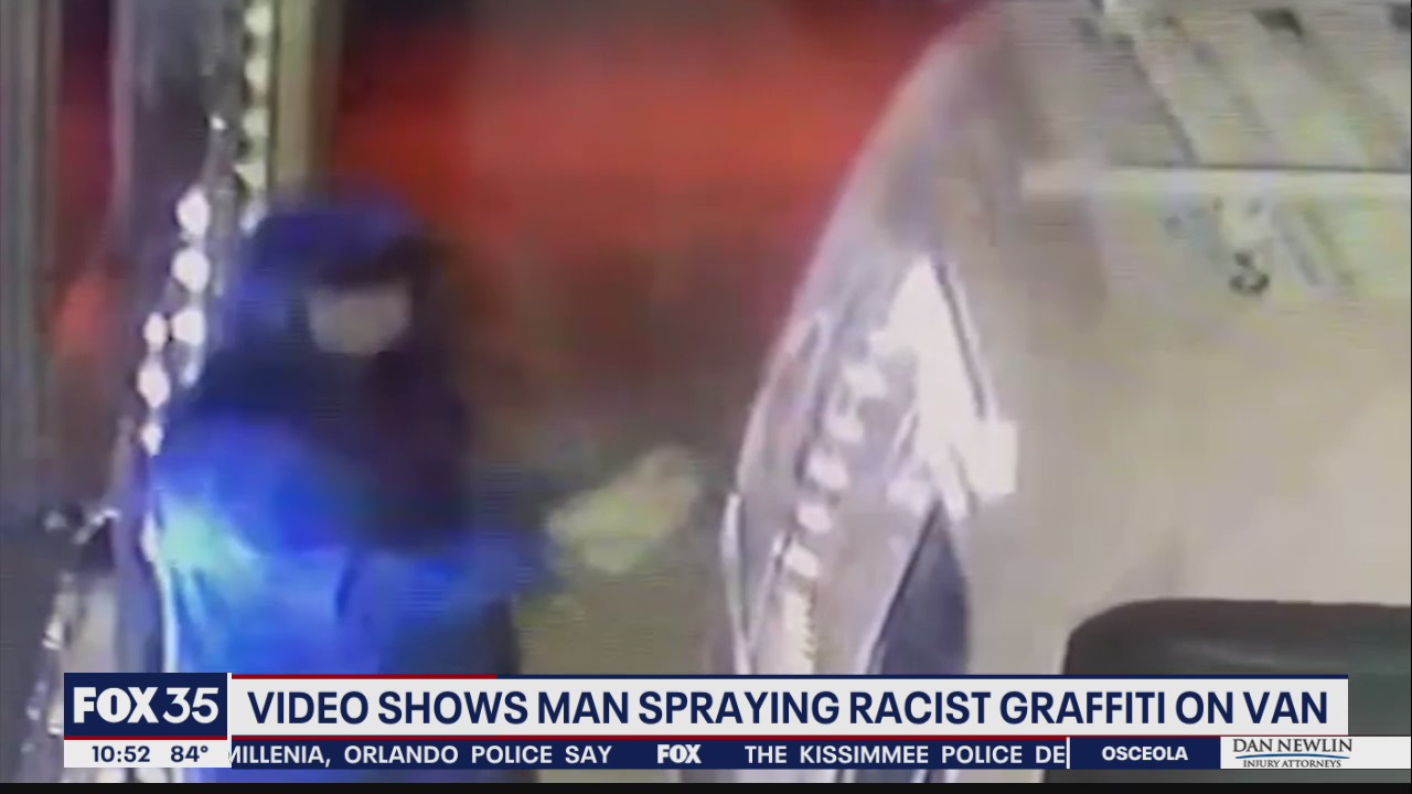 Video shows suspect spray-painting racist graffiti on van