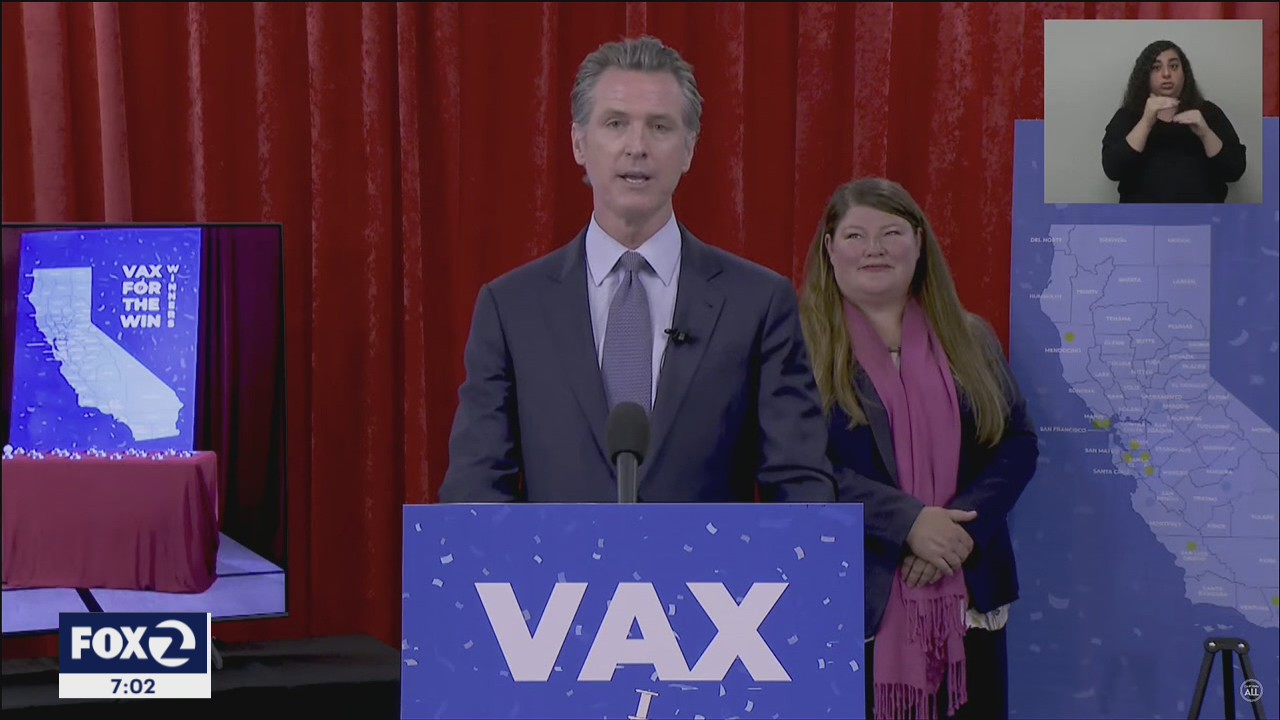 California governor signs orders to roll back virus rules