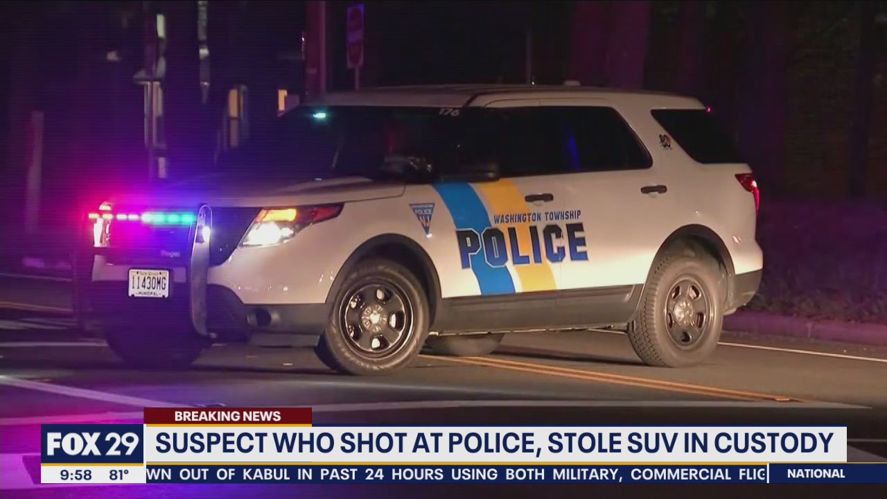 Suspect who shot at police, stole SUV in custody