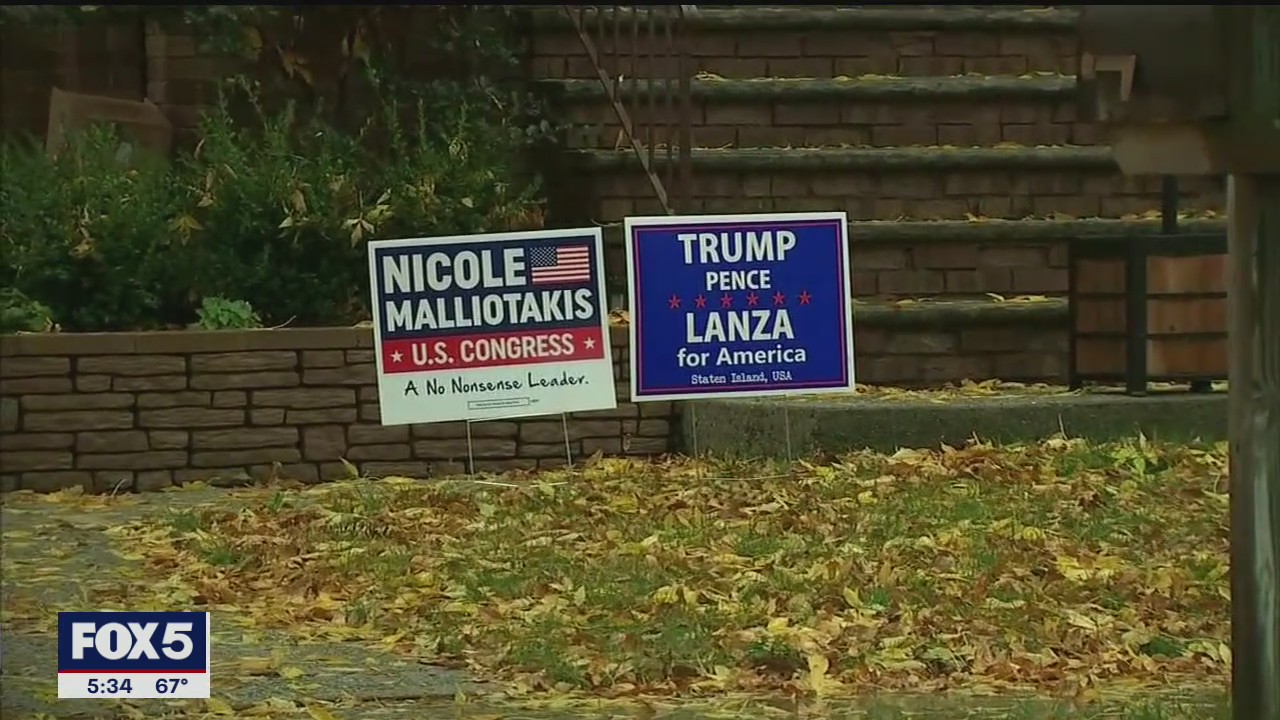 Donald Trump supporters on Staten Island stand behind President
