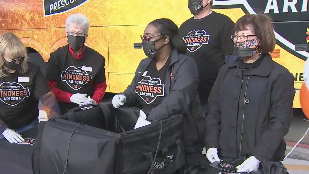 Desert Financial Fiesta Bowl Kindness Arizona Caravan surprises GCU vaccine volunteers with breakfast