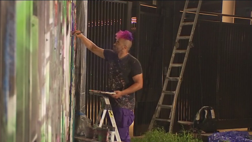 Austin FC commission local artist to paint mural on Q2 Stadium