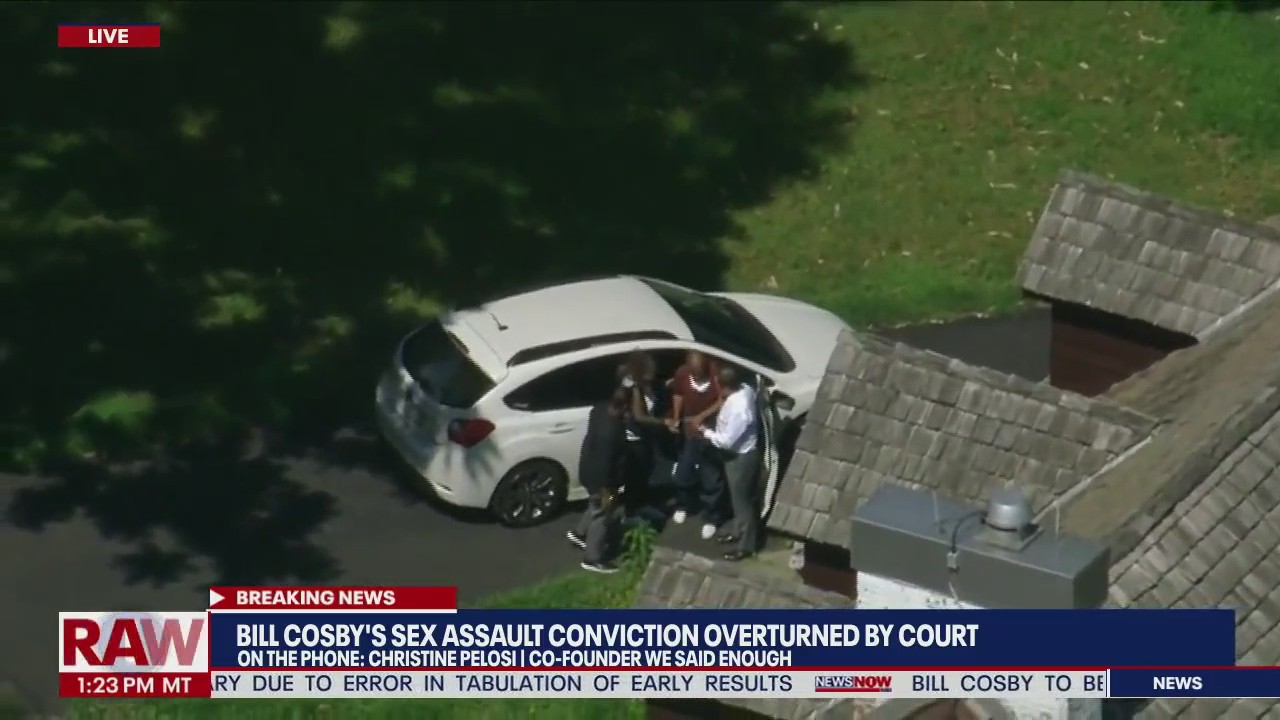 Bill Cosby arrives home
