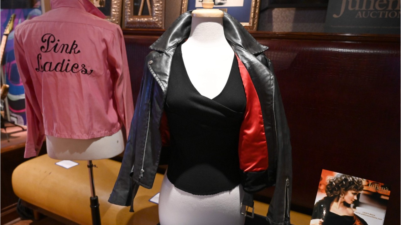 Fan buys iconic leather jacket from ‘Grease’ for $243K, gives it back to Olivia Newton-John