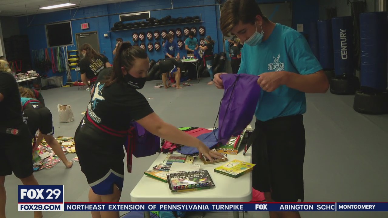 Young martial artists put together healing kits to help children dealing with domestic violence