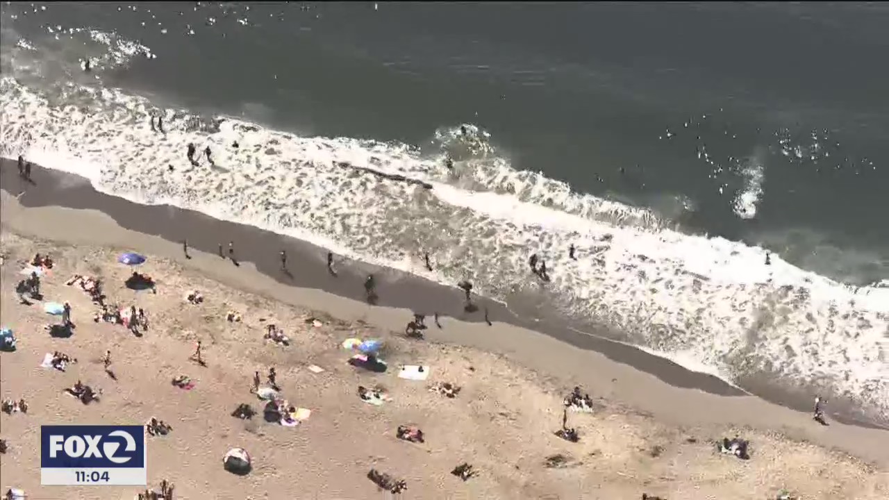 SkyFox captures beach goers properly distanced for pandemic during heat wave