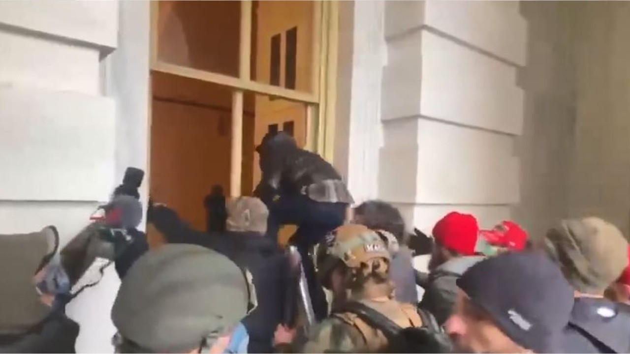 Trump supporters smash windows at US Capitol