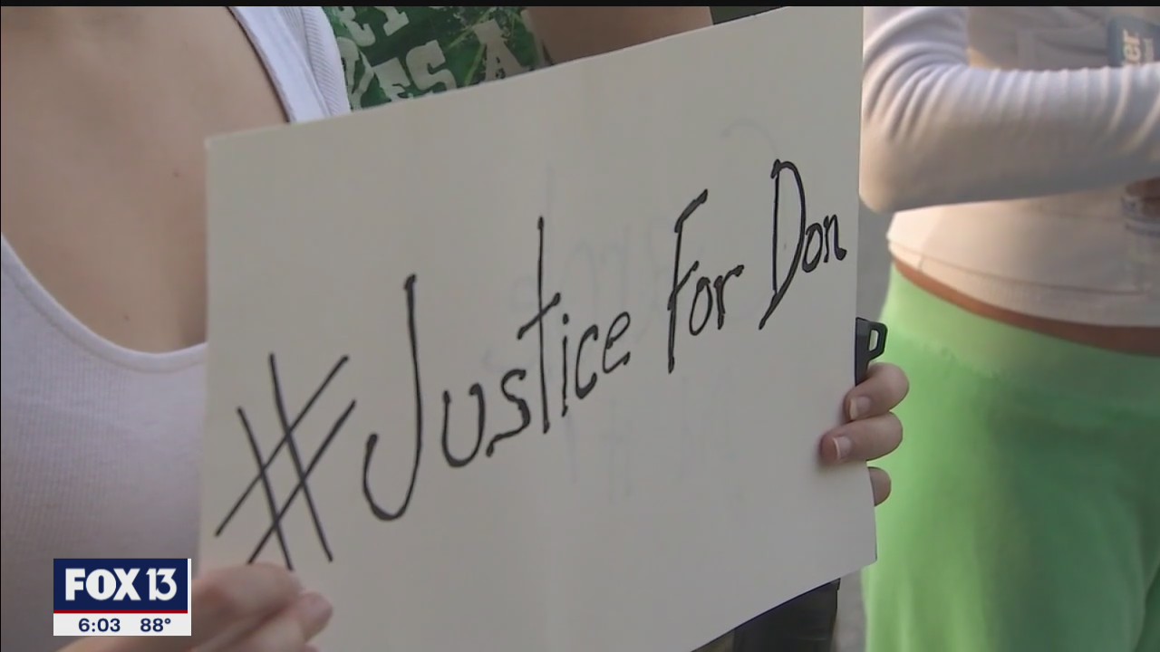 Crowd demands justice for Don Lewis