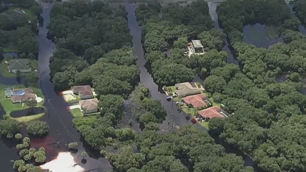 North Port residents leave homes hoping water stops rising