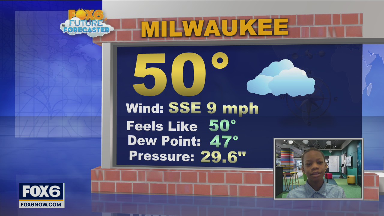 11-year-old Nayshawn helps with the weather