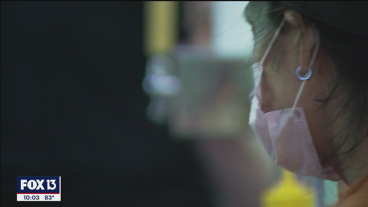 Tampa, St. Pete give away masks after requirements kick in