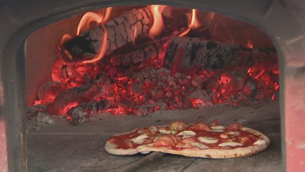 Brick-oven pizza on the sidewalk