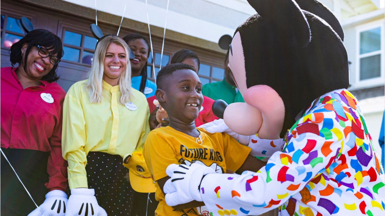Boy who donated Disney savings surprised with free trip