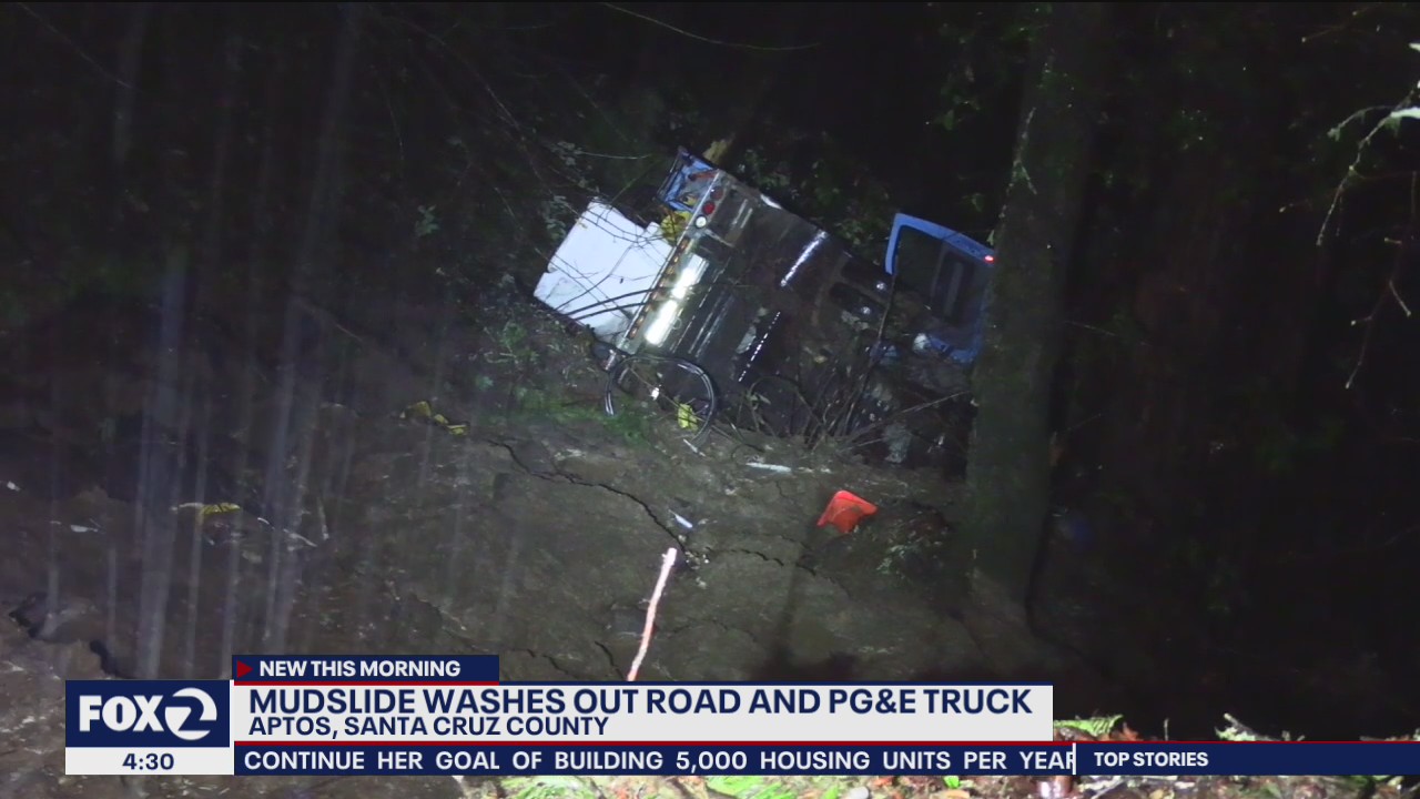 Mudslide sends truck down road