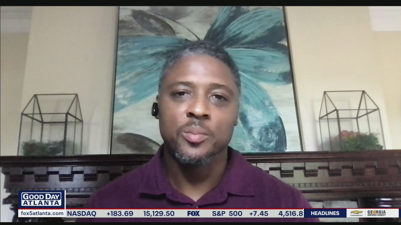 Former Falcons running back Warrick Dunn hosting vaccination event