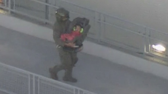 Baby rescued after cliffside crash, 1 dead