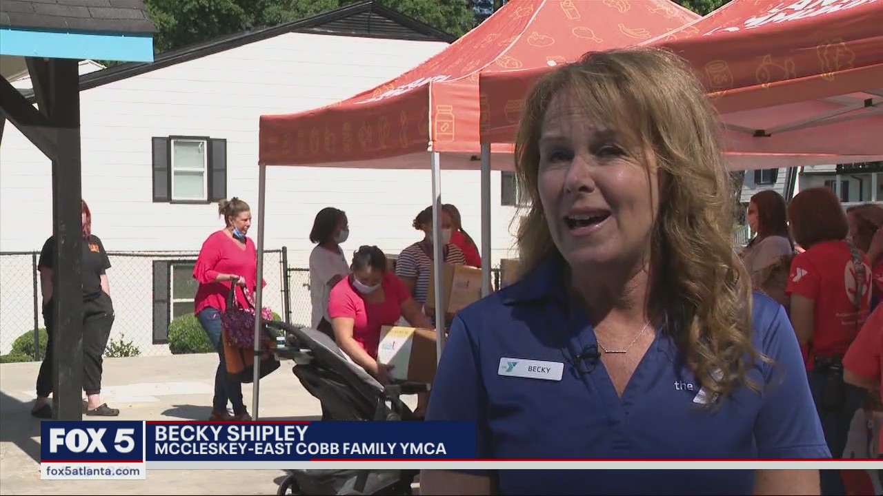 Local organizations pass out meal kits to Cobb families