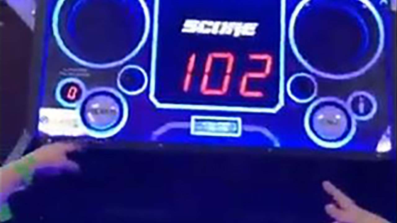 NBA-aspiring brothers nail every shot in basketball arcade game
