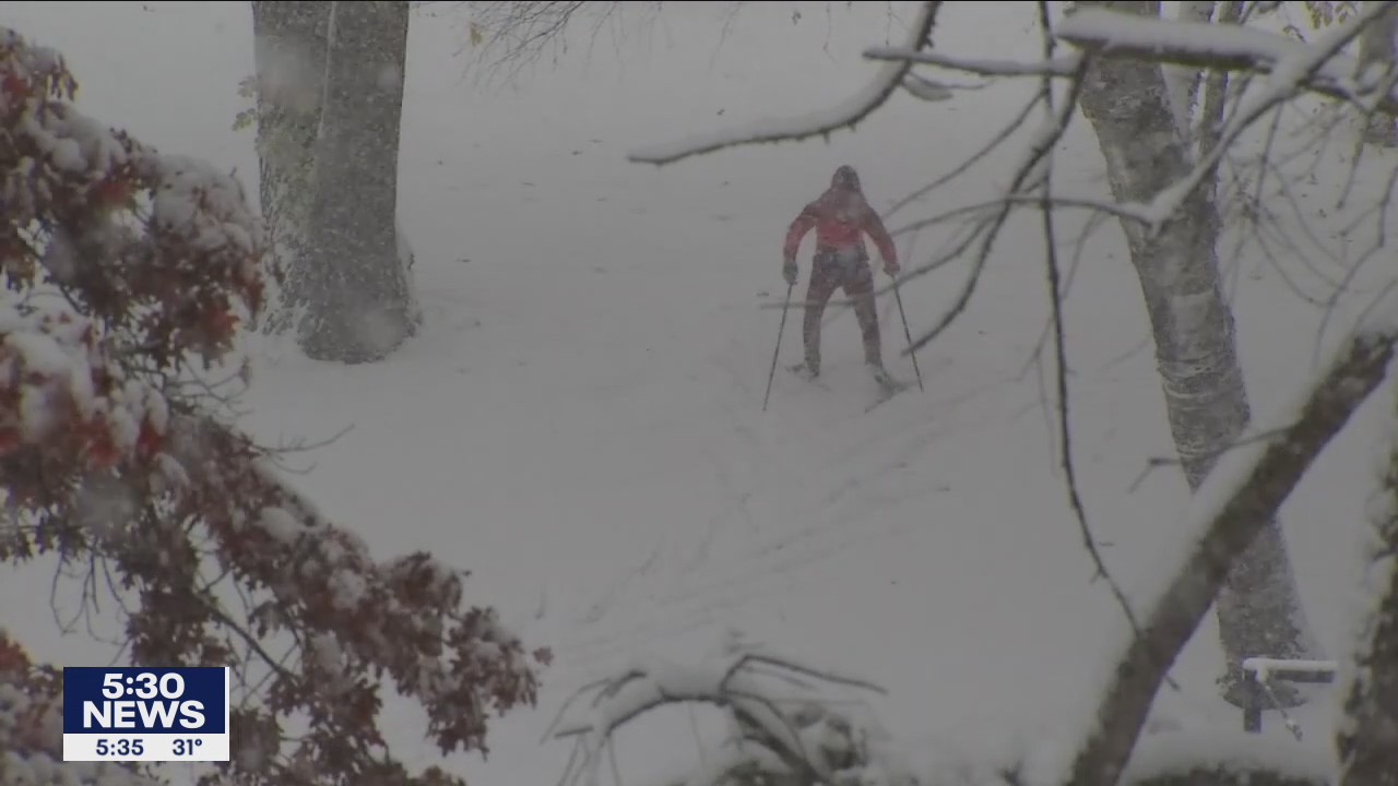 Minnesotans embrace October snow