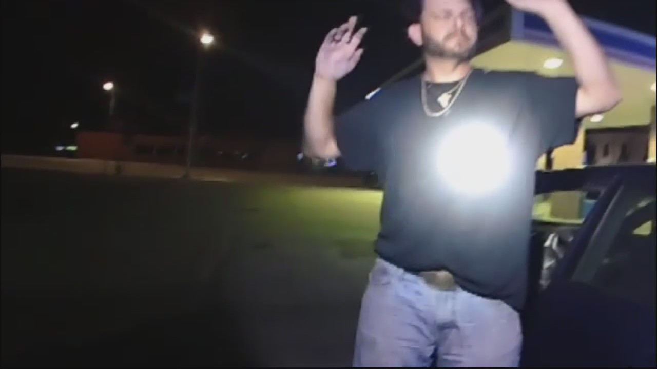 North Carolina man found sleeping in car with guns, drugs and young son inside