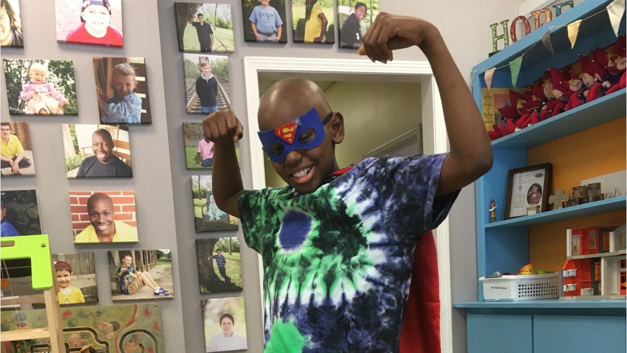 ‘Stay happy, stay strong’: Inspirational 11-year-old rings cancer-free bell in time for the holidays