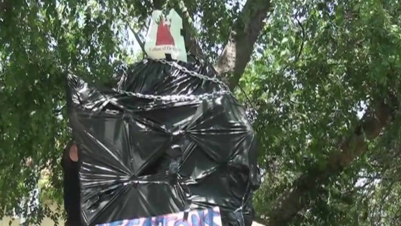 Junipero Serra statue covered by protesters