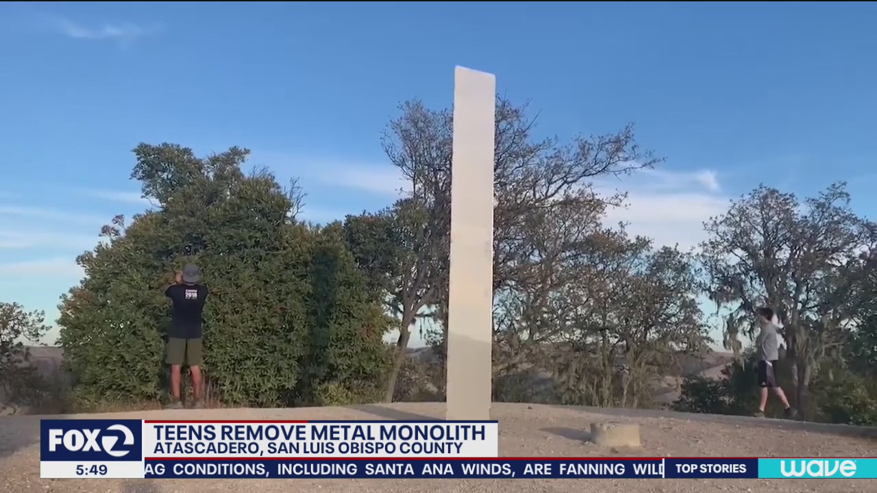 Teens remove metal monolith