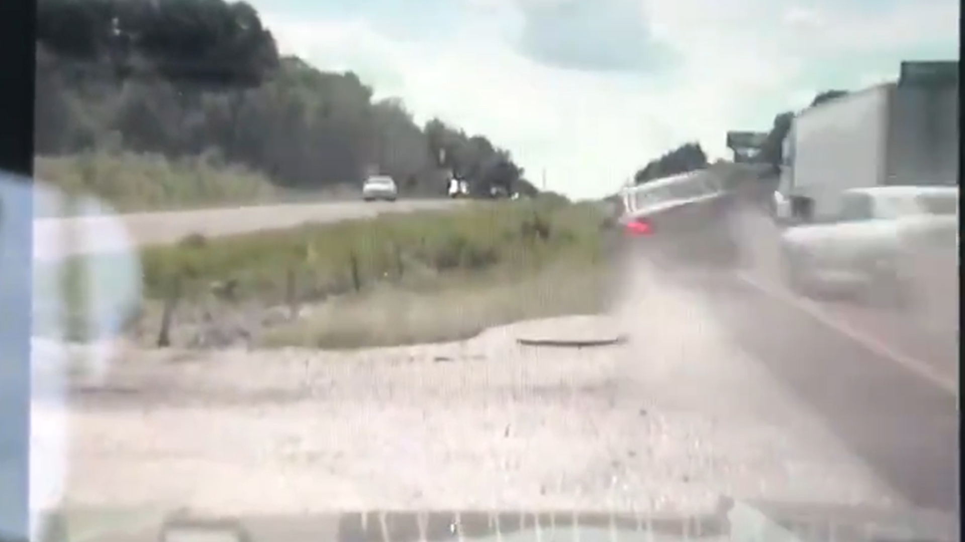 Dashcam shows impaired driver almost hits state trooper car, flips over