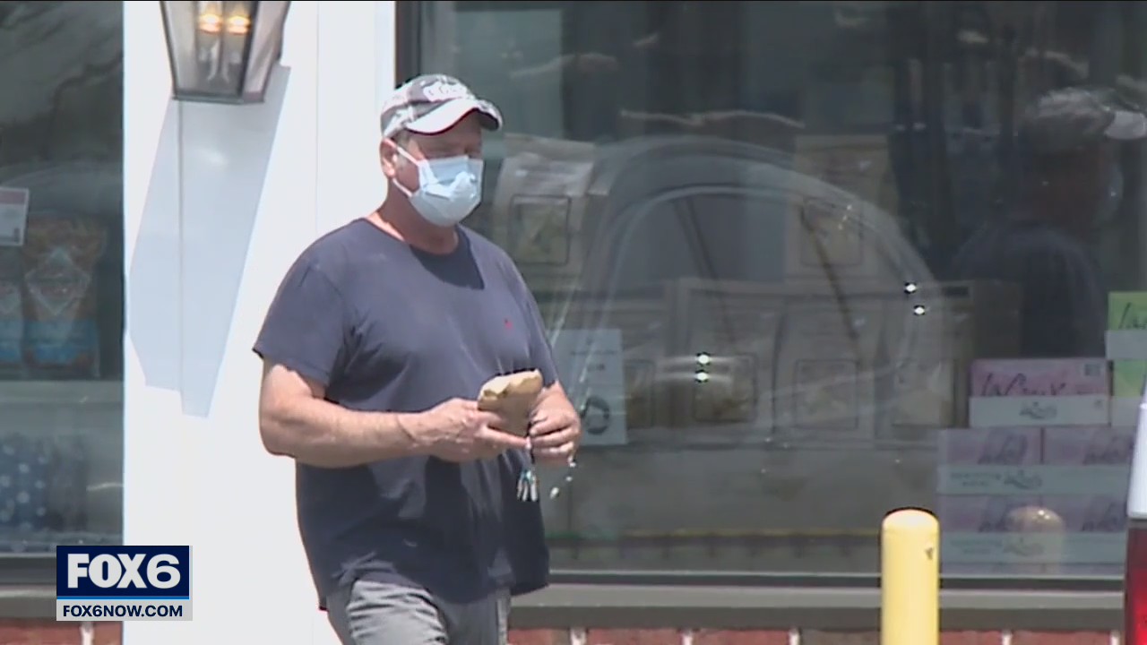 COVID vaccine hesitancy remains, mask opinions vary