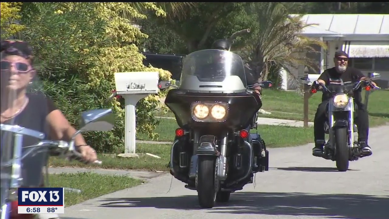 Biker group gives computers to kids who need them