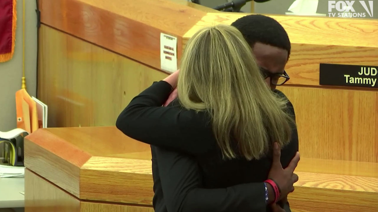 Slain man's brother forgive's Dallas officer after she gets 10 years in prison