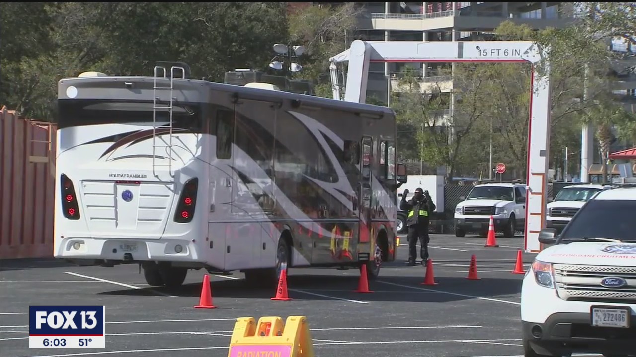 Customs and Border Patrol sweeping cargo during Super Bowl