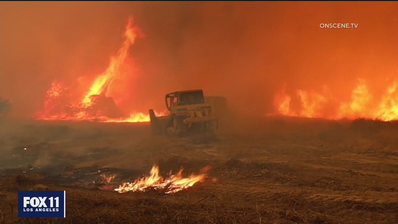 Crews continue to battle massive fire in Yucaipa